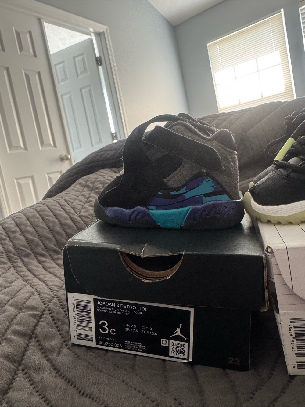 Jordan Toddler Shoes in Black with Teal and Purple Accents